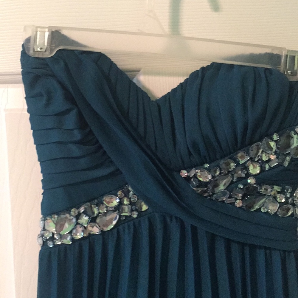 Teal strapless formal gown